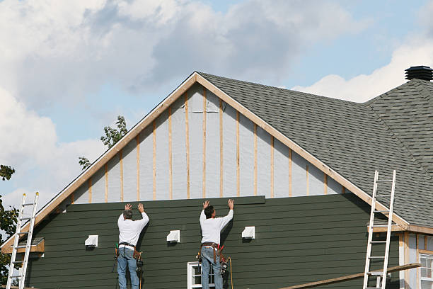 Professional Storm Damage Siding Repair technician working in Annville, PA